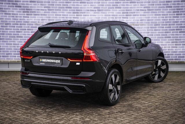 Volvo XC60 2.0 T6 Plug-in hybrid AWD Ultra Dark | Trekhaak | Adaptive cruise control | Head-up display | Harman/Kardon audio | Dode hoek detectie BLIS | Stoelverwarming voor + achter | Stuurverwarming | Elektrische stoelverstelling |